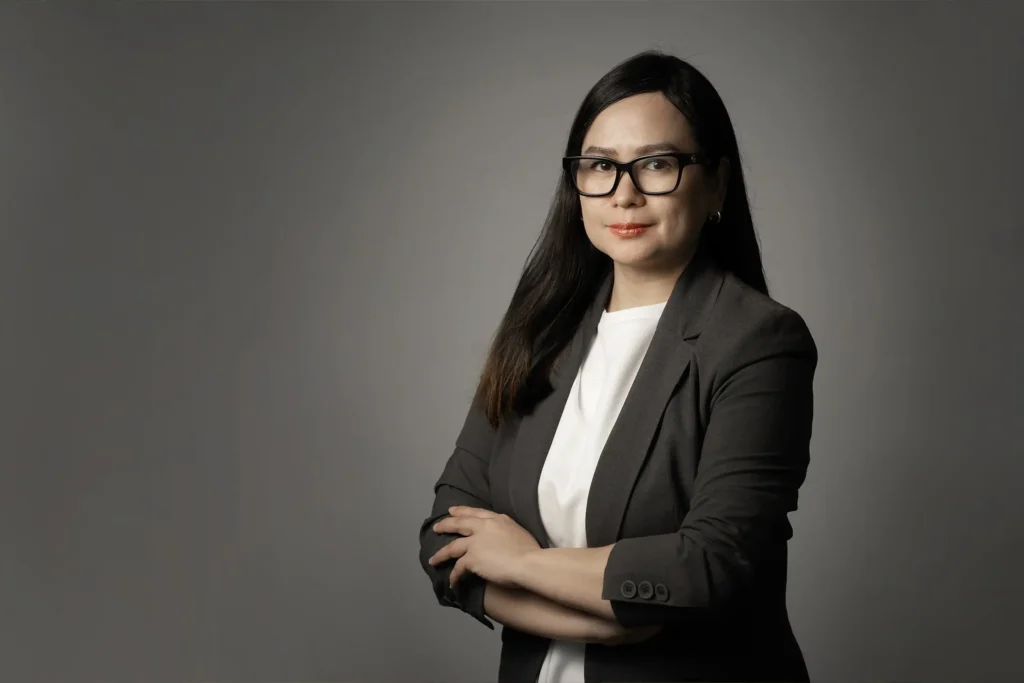 Corporate headshot photography of a businesswoman in a Dubai studio